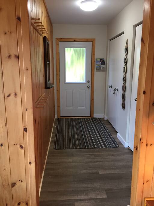 Side entrance with plenty of space for everyones shoes, jackets and gear.