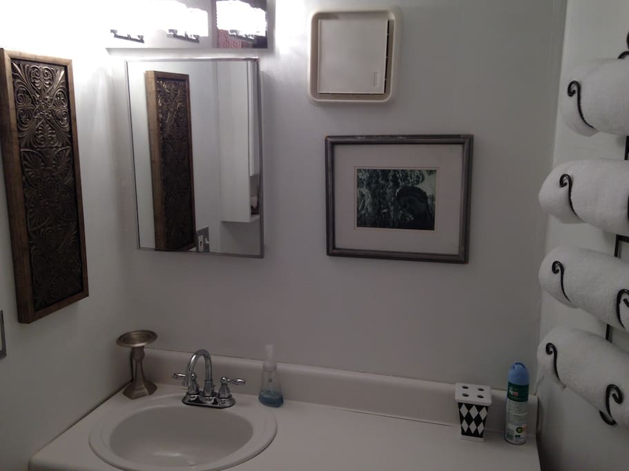 Bathroom is off of bedroom 1 and stocked with plush towels