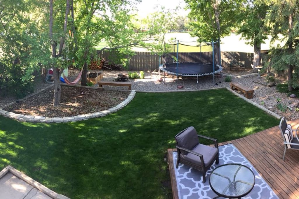 Feel free to relax in our backyard, or explore the park directly behind our property.