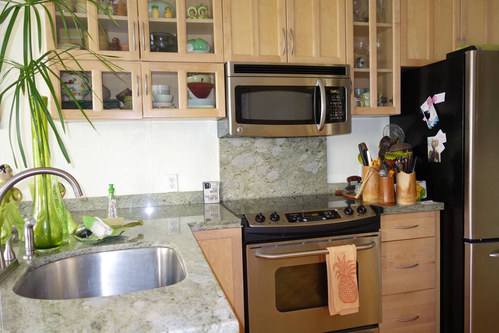 My little kitchen has everything needed to whip up a good meal. There are plenty dishes and utensils, a great oven, new fridge and you can serve right across the counter where a couple of stools make for perfect seating.