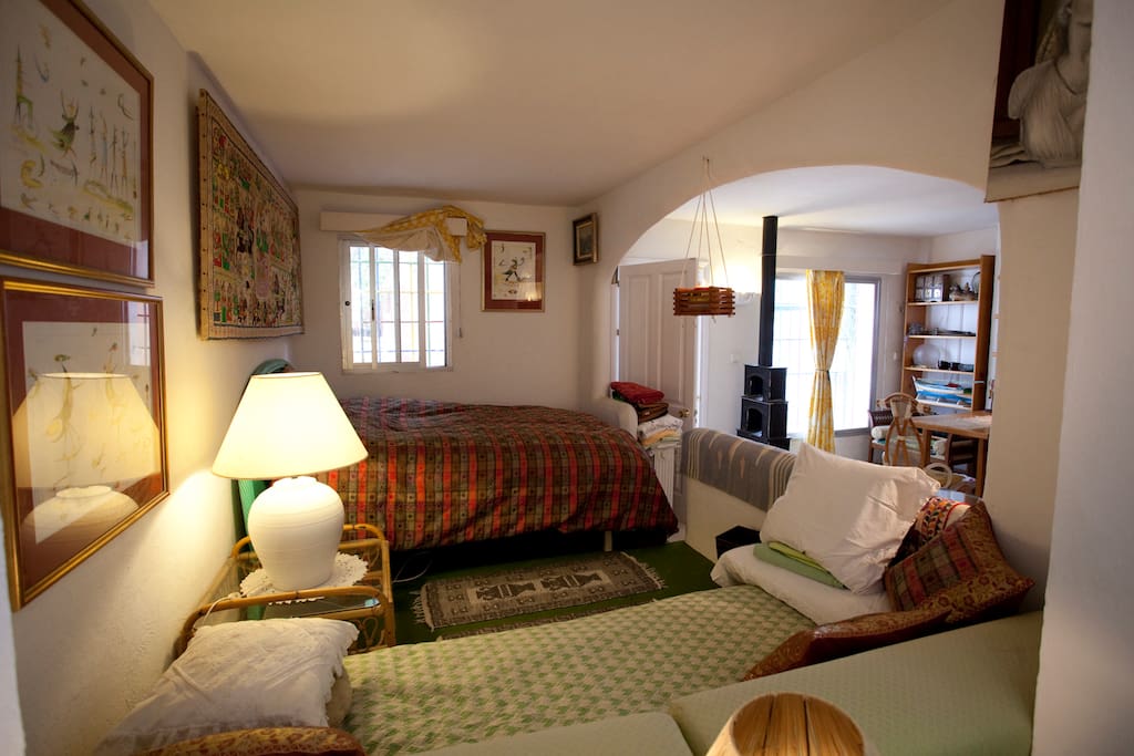 Cozy sleeping are with wood stove.