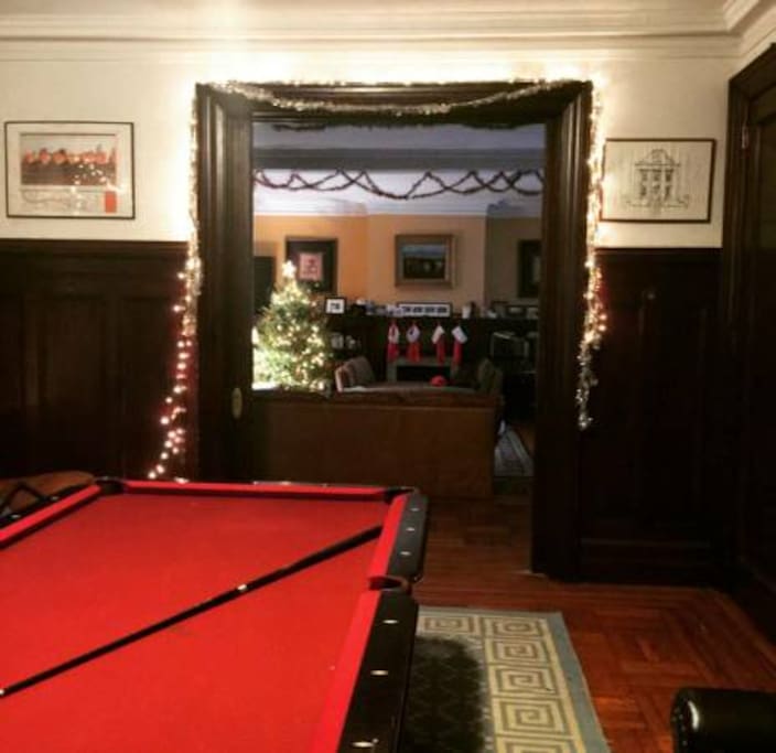 One living room extends to the other (pool table!) but can be closed off for privacy