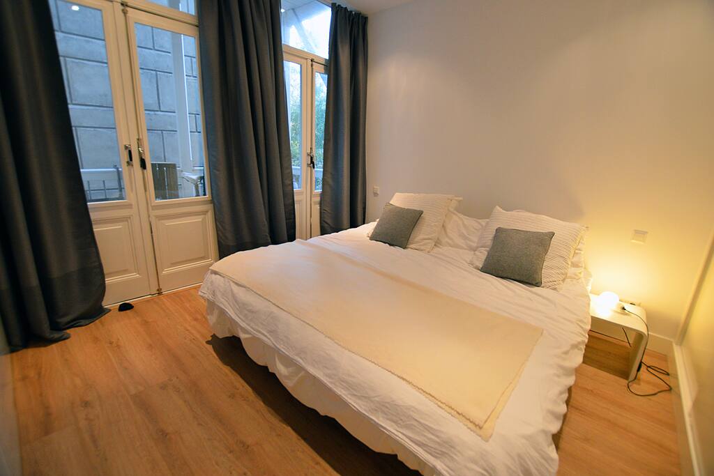 The bedroom includes this comfortable bed