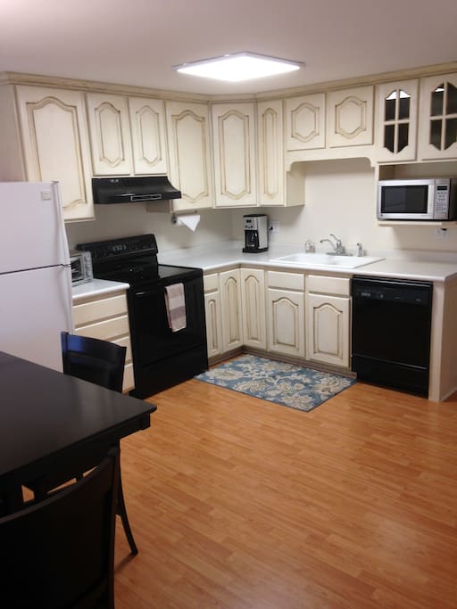 Spotless kitchen with all the necessities to cook your own meals.