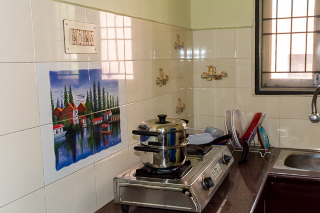 Kitchen with necessary utensils, cooking gas provided.