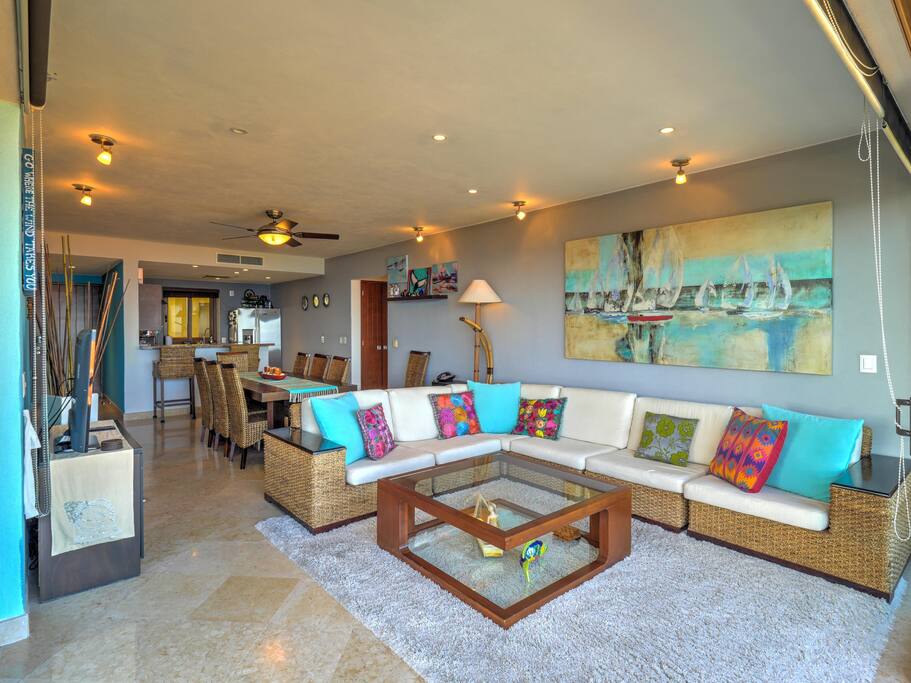 large sectional over looking the patio and the bay