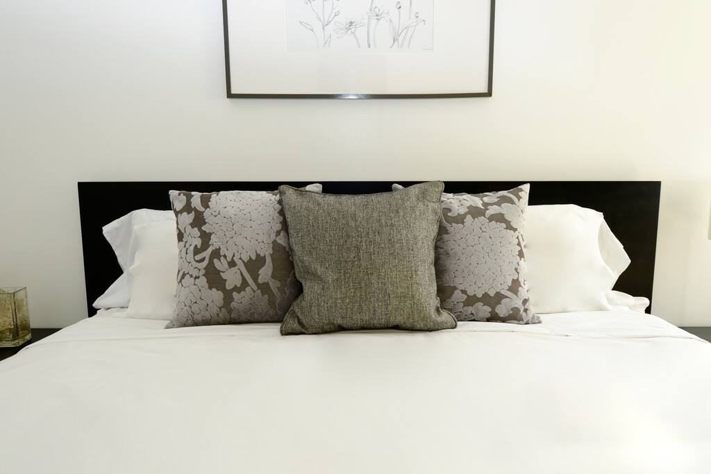 Master with King Bed and Flat Screen TV on Wall.