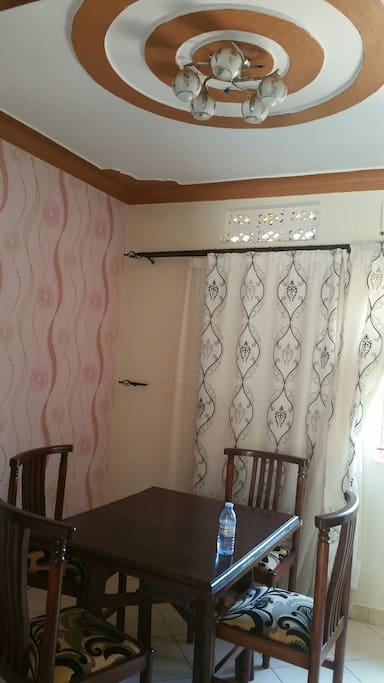dinning room with wall papered