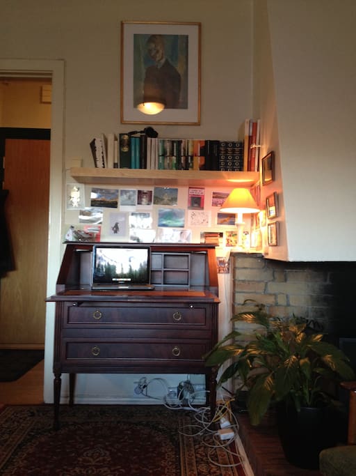 Fireplace and writing desk.