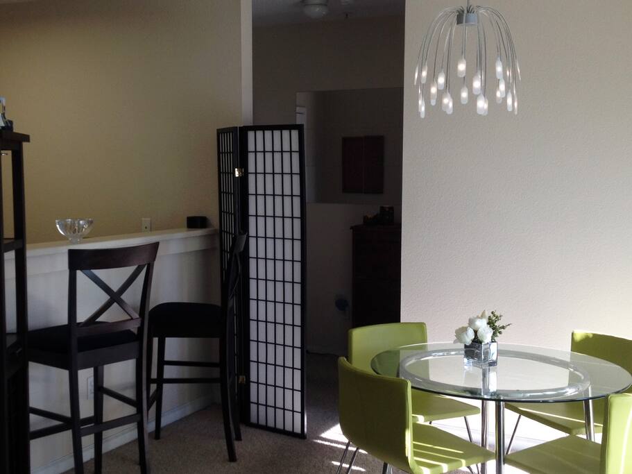 Dining area with bar area overlooking the kitchen