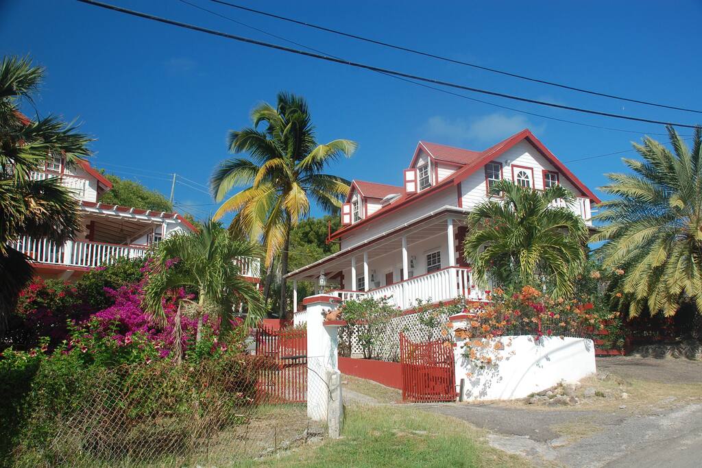 An exterior shot of the property and the gardens