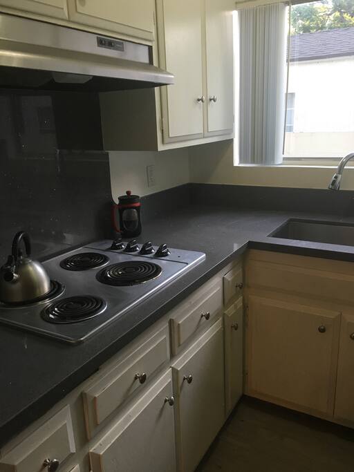 Full kitchen access including use of french press, espresso machine, dishes & utensils