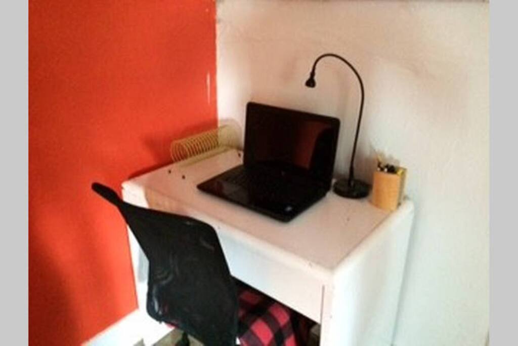 Desk/work space in the red bedroom.