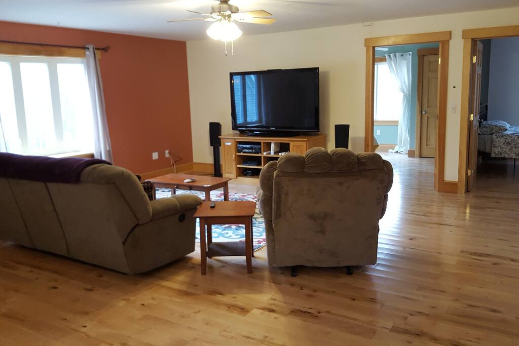 Enjoy a movie in comfort while watching our 65 in. screen with surround sound or grab a Wii remote for a game of Mario Kart