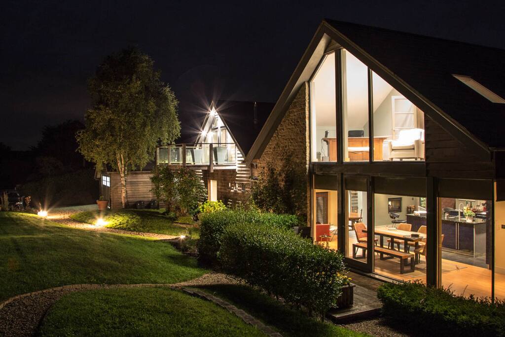 Floor to ceiling windows in many of the rooms at night