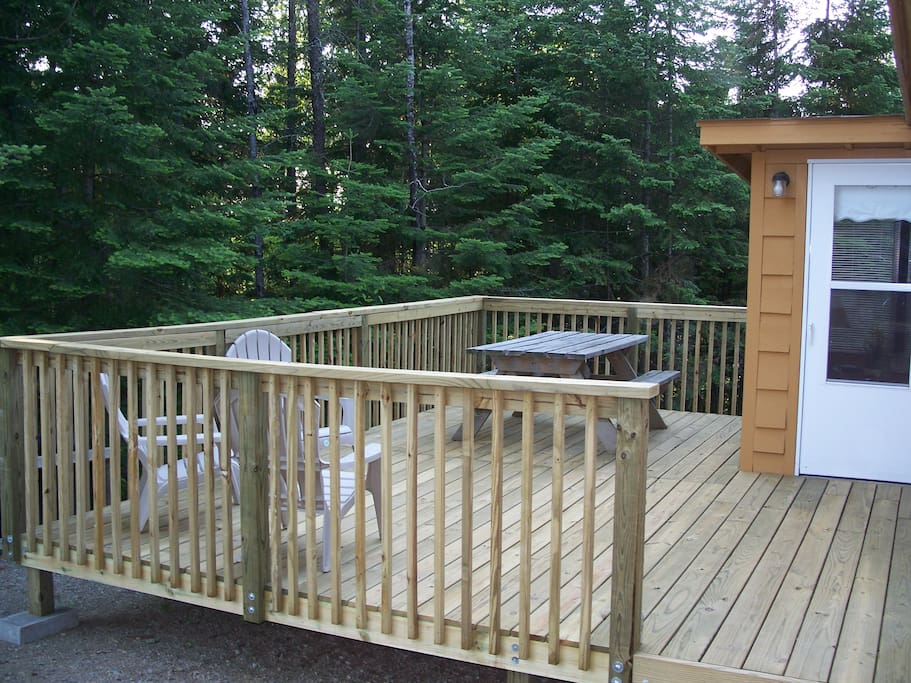 Spacious Deck with Picnic Table and Chairs