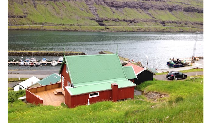 cozy home by the river; funningsfjørður, eysturoy