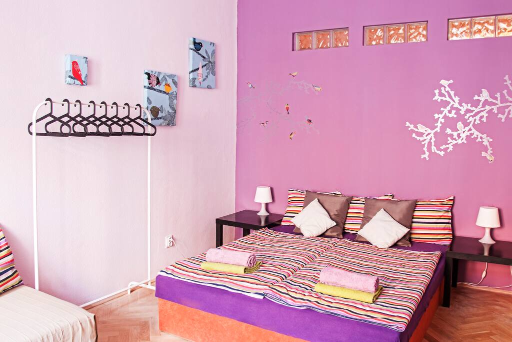 Sunny, spacious and vibrant room (beds can be used as double or twin)