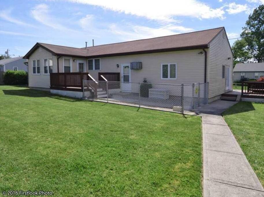 spacious backyard with deck