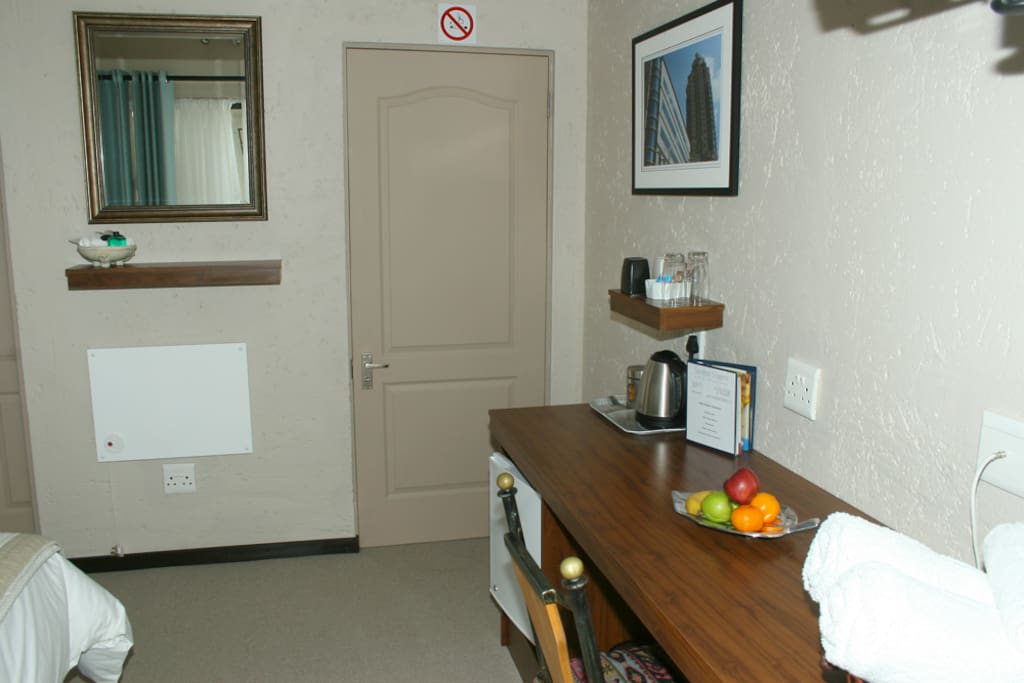 Room 4, large built in cupboard and desk