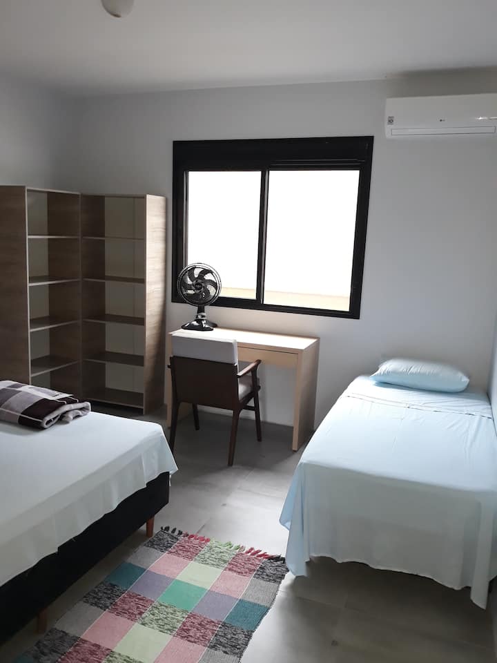 Room 2 (en-suite), with a double bed and a single one.