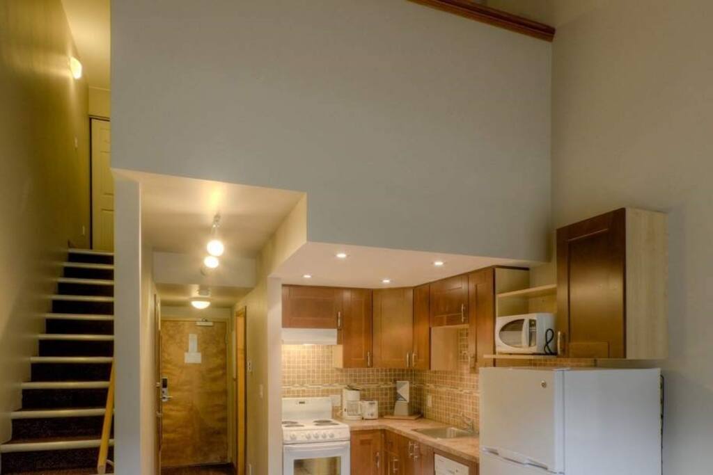 Upstairs, there is a loft with additional sleeping area