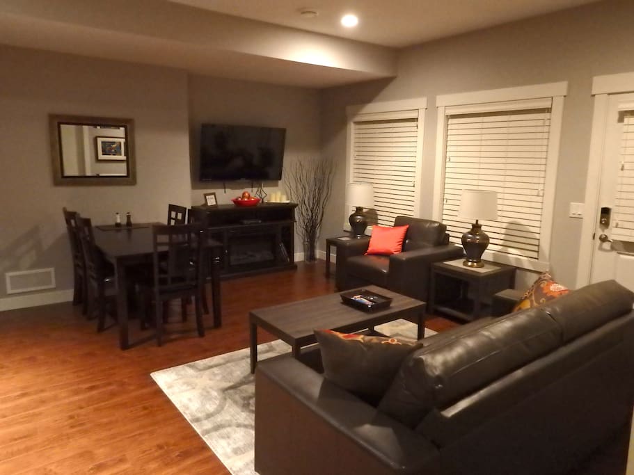 50 " TV with free cable, Netflix, Youtube. Electric Fireplace for ambiance.