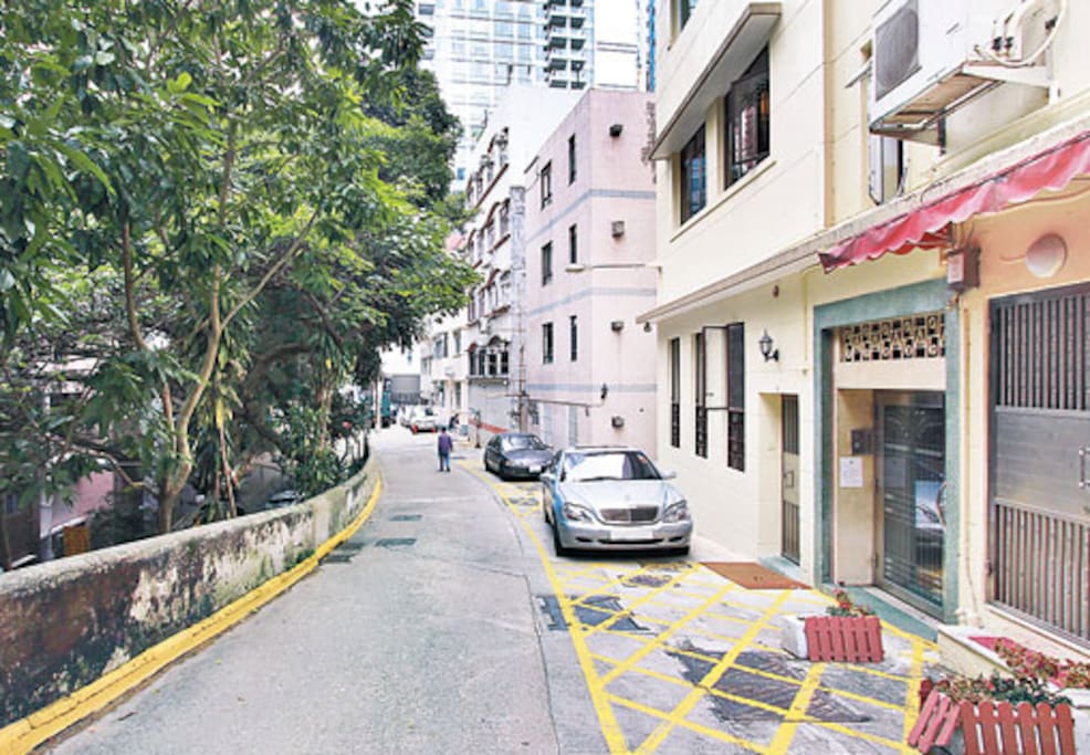 Quiet street with greenery and waterfall around. Relaxing hidden gem close to the city center.