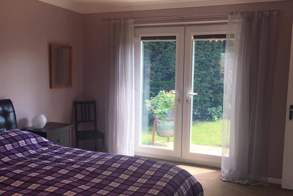 Spacious double bedroom with King bed