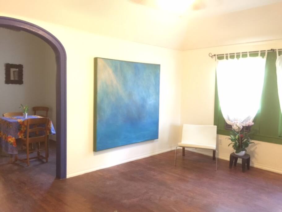 Front room. BluDot chair and futon couch that can sleep two.