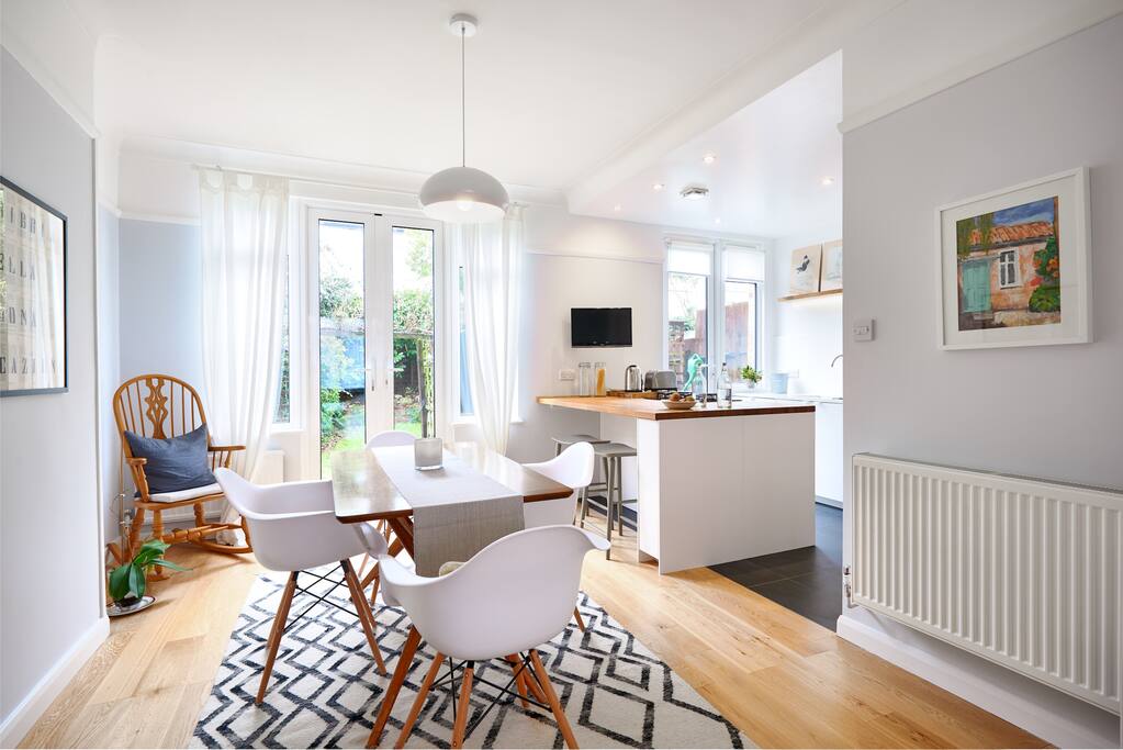 Large light spacious dining area and modern kitchen