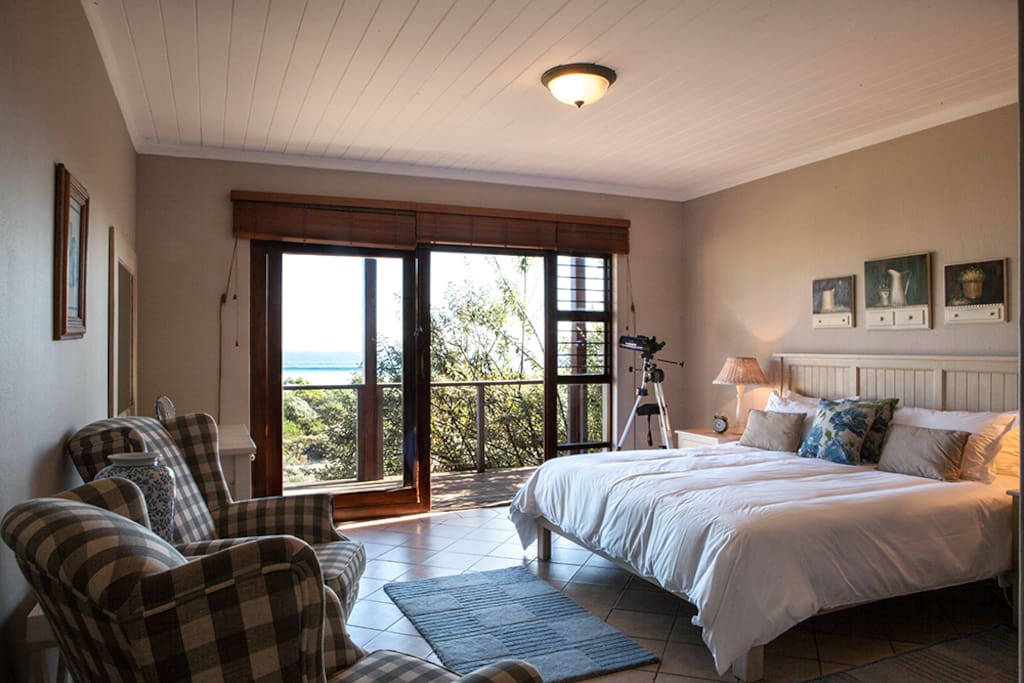 Main bedroom with ensuite bathroom situated upstairs with stunning views.