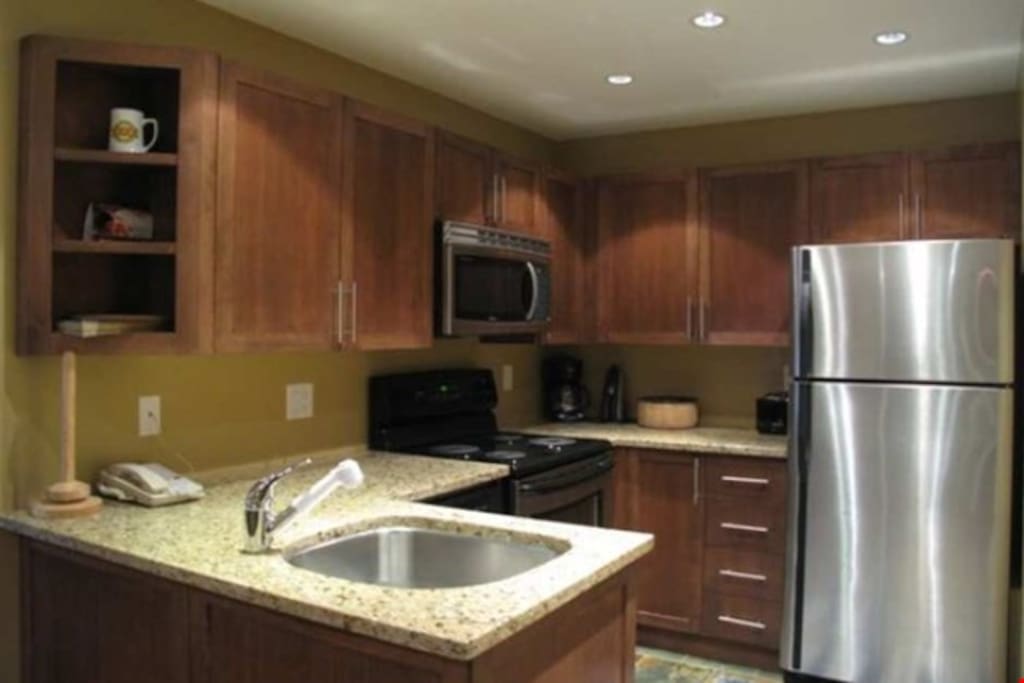 The fully-equipped kitchen comes with everything you need to cook meals in the privacy of your own suite.