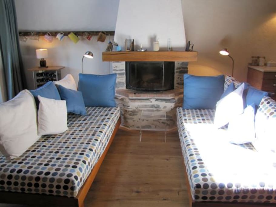 THE SITTING ROOM WITH LOG FIRE