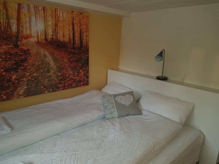 A nice double bed, perfect for a couple.