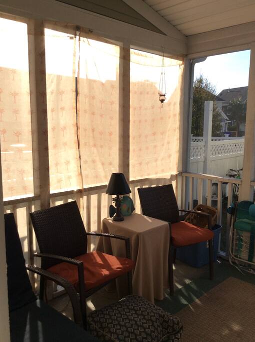 Screened in porch. You will enter through this area.