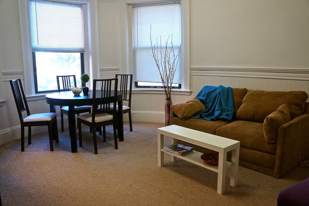 Living room with extendable dining set fit up to 6 people.