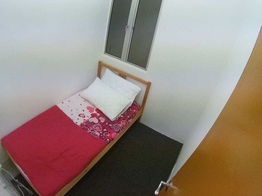 small room with single bed