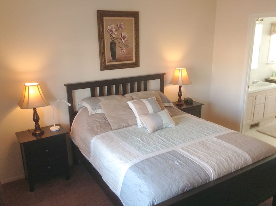 Master bedroom has queen size bed, dresser, iPhone charger/radio/alarm