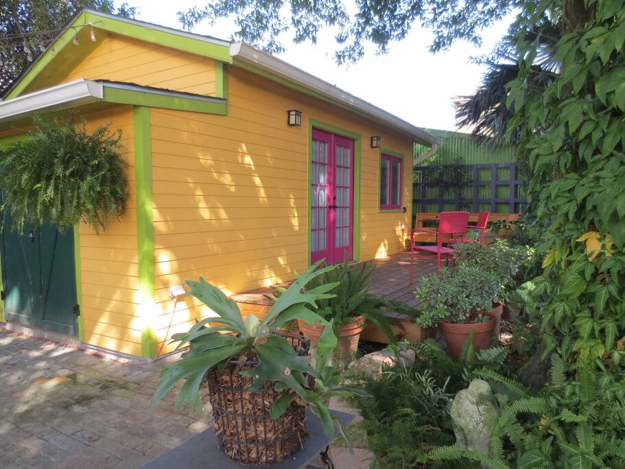 The brick patio behind our house leads to your private deck.