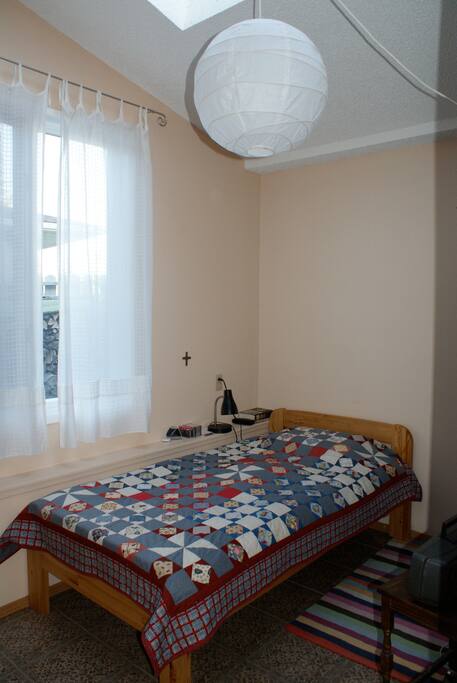 Relax in the cozy guest bedroom