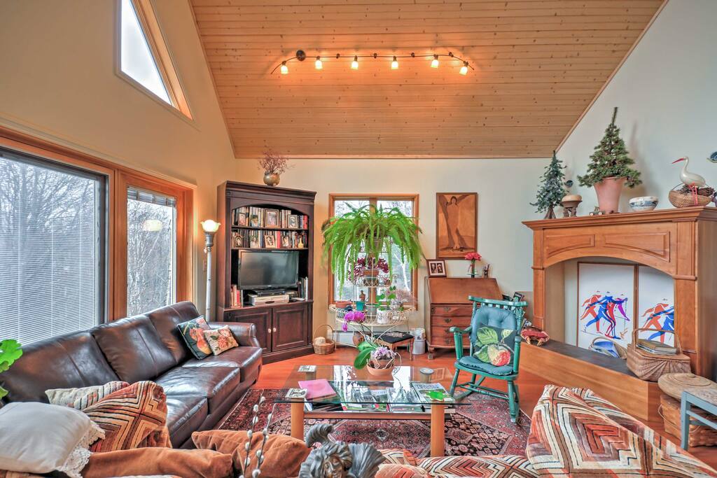 A facade of expansive windows welcomes you into your coastal Maine getaway!