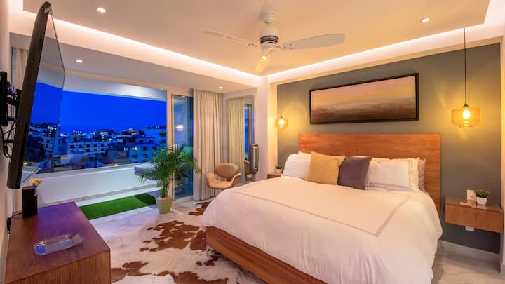 Master Bedroom off the terrace with Ocean and City views 