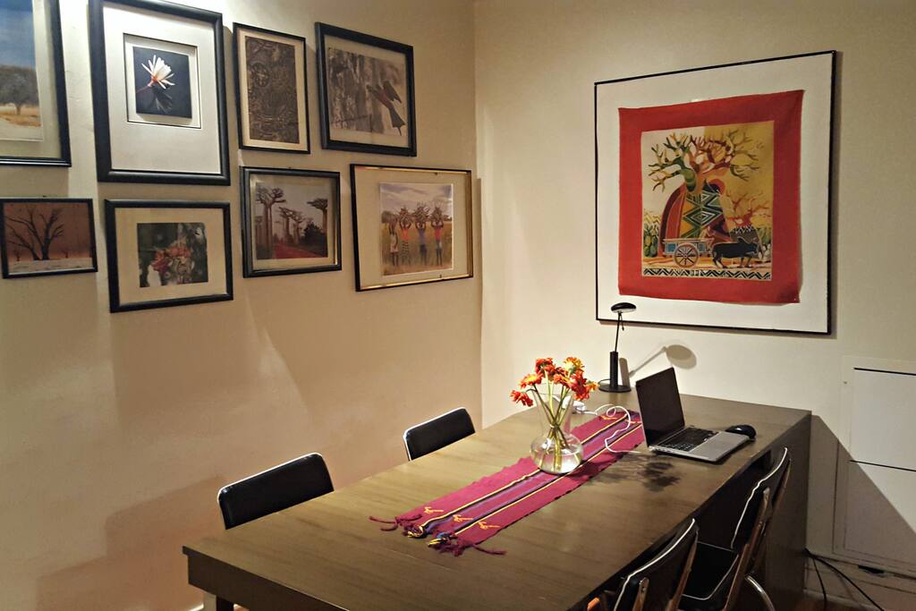 The dining room table can expand to comfortably accommodate 6 guests