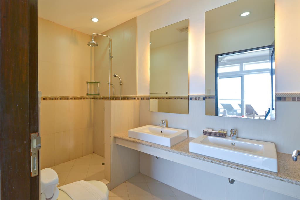Rain shower with his & hers sinks