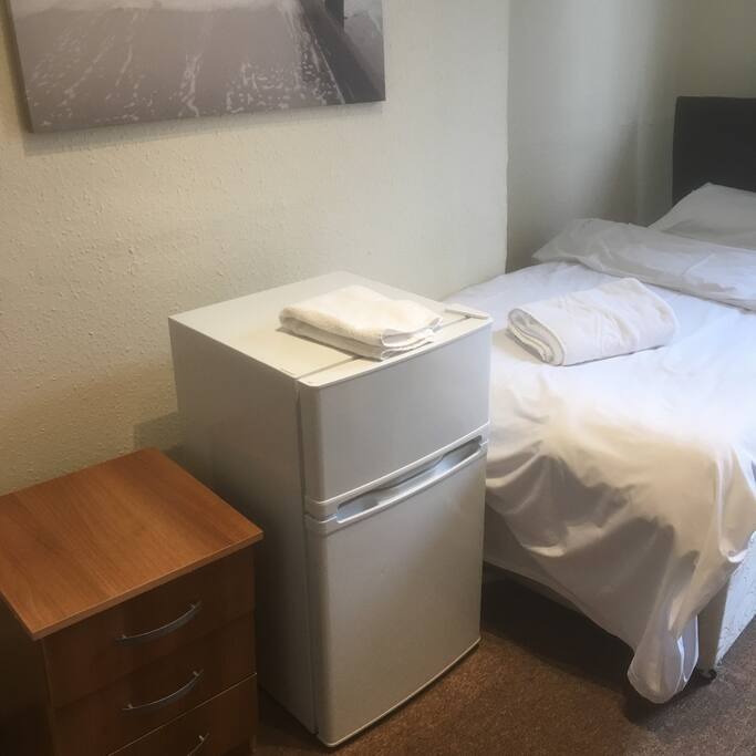 A mini double door fridge-freezer added to the Room recently