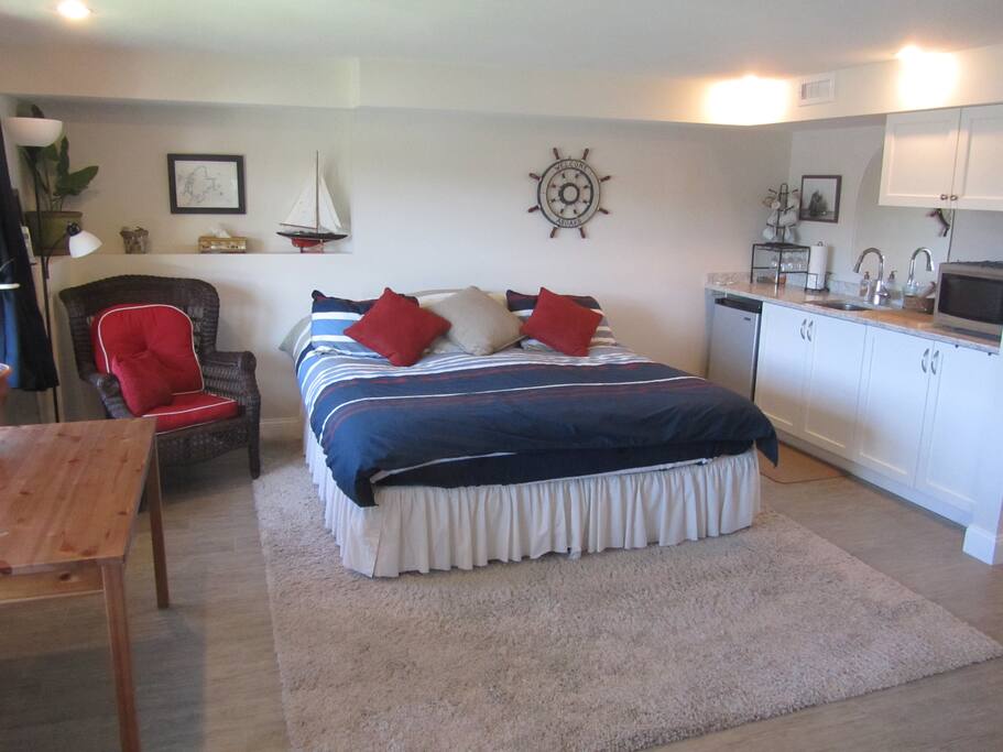 Bedroom with partial kitchen