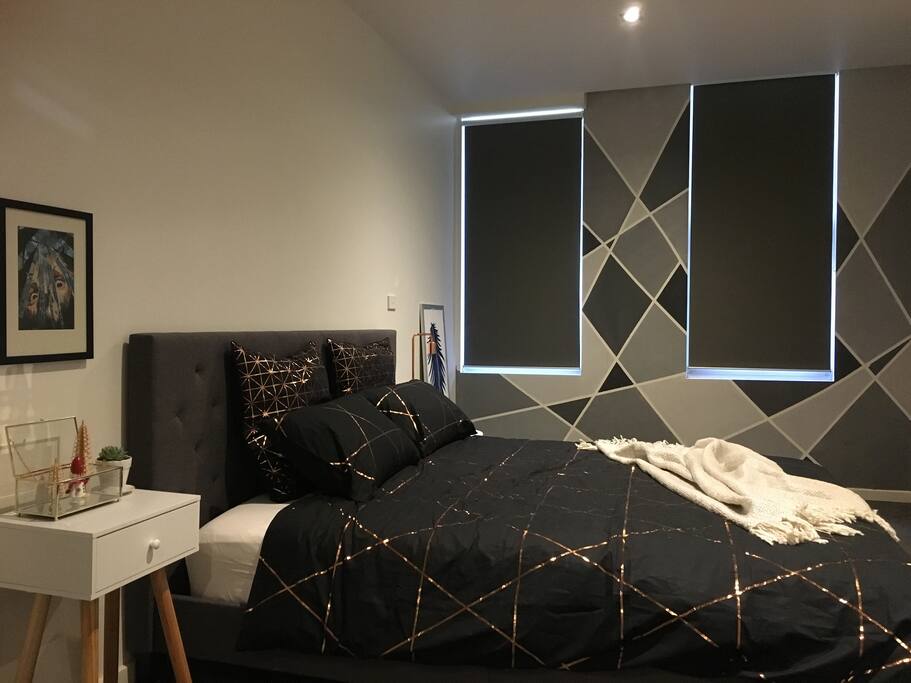 main bedroom - king size bed with blinds down