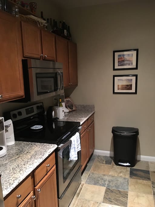 Stainless steal appliances and granite countertops.