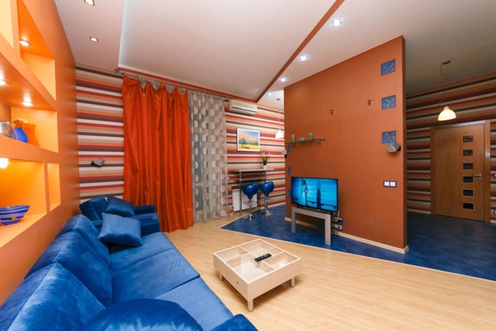 Living-room with open studio-kitchen